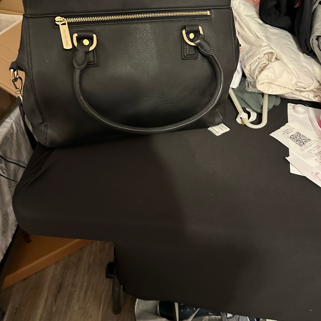 Michael Kors Black Leather Shoulder Bag With Gold Accents.